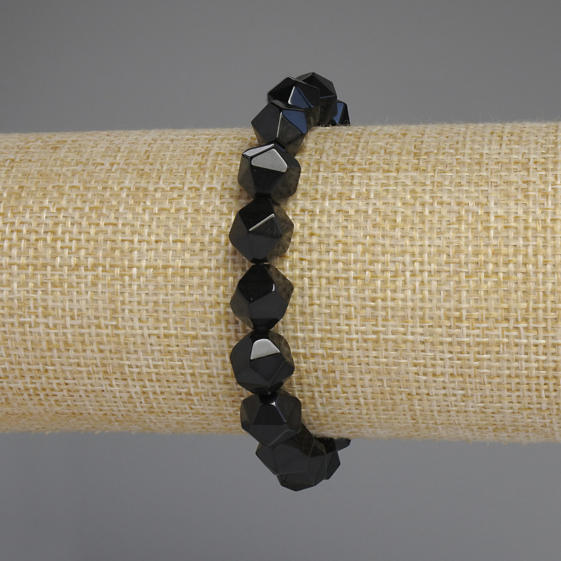 Bransoletka z czarnego onyksu — wielokątne fasetowane kuleczki, średnica 10×8 mm, długość 18 cm, elastyczna