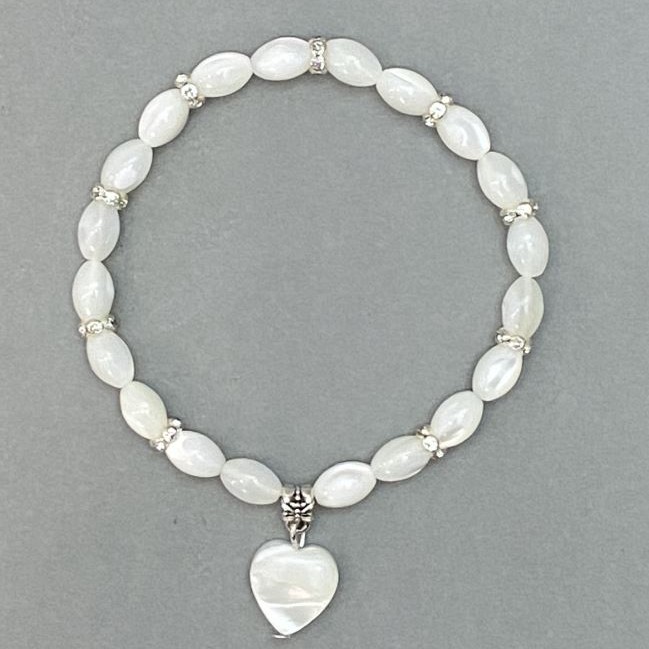 Bransoletka z masy perłowej «Ziarenko», koraliki o wymiarach około 9×6 mm, długość 18 cm, na elastycznej bazie streczowej