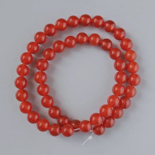 Koraliki z karneolu, naturalny kamień, gładkie kuleczki, średnica 8 mm ±, długość 38 cm ±, na nitce