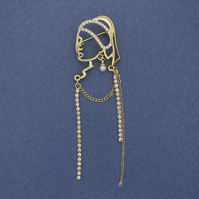 Broszka «Dziewczyna z perłą» z białymi cyrkonami i złotym metalem, 85×24 mm+