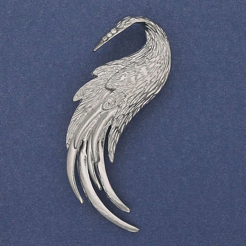 Broszka Feniks z białymi cyrkoniami, srebrzysty metal 60×37 mm+