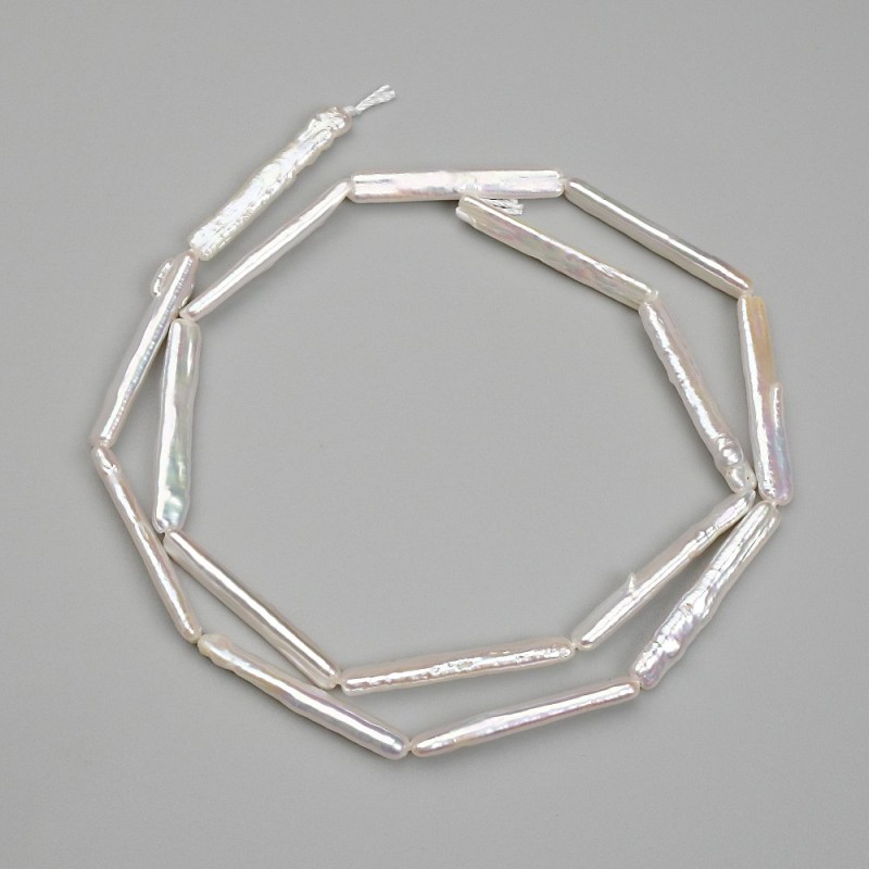 Koraliki barokowe w odcieniu benzynowym, 25×4 mm, długość około 39 cm