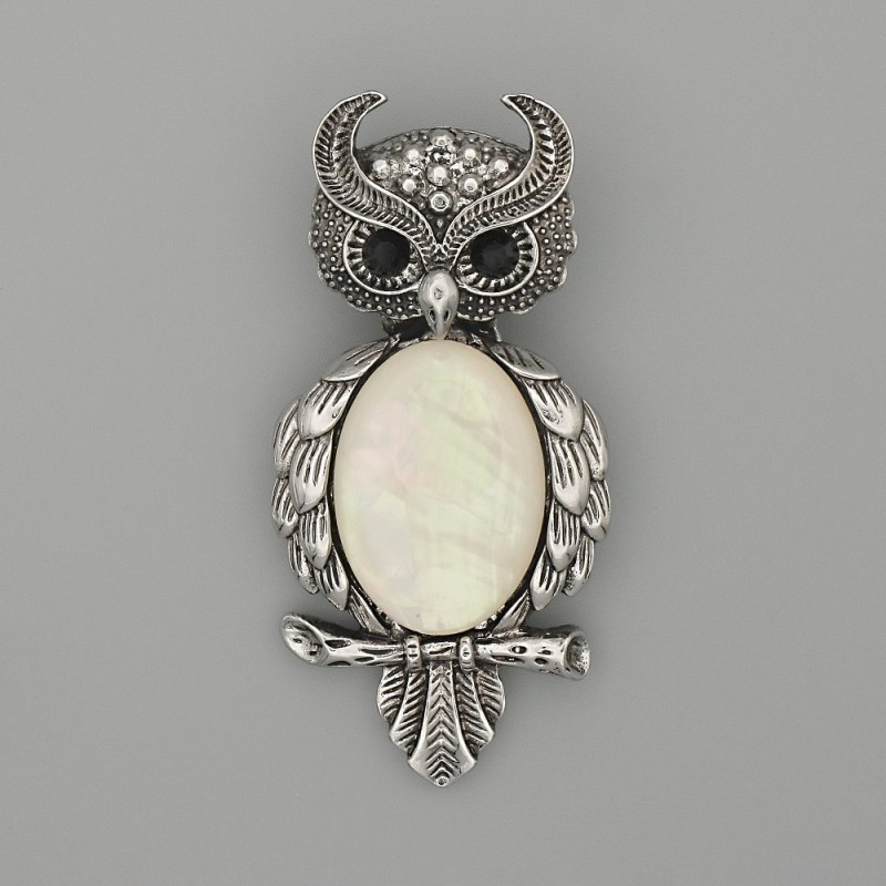 Broszka-wisiorek Sowa z perłowym połyskiem, 60×29 mm, ± czarne kryształy, metal srebrzysty