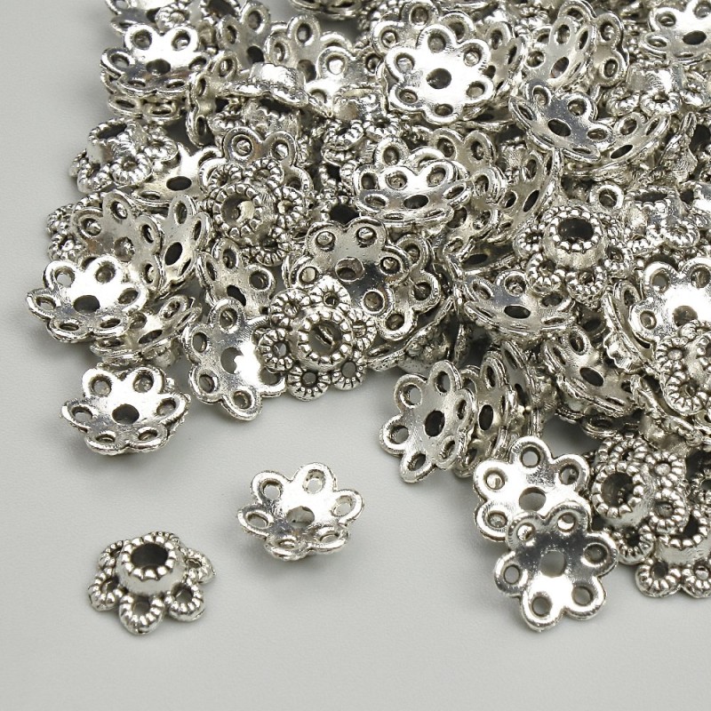 Czapeczki do koralików, średnica 7 mm ±, otwór 1,9 mm ±, srebrzysty kolor metalu, opakowanie 20 g ± (~125 szt.)