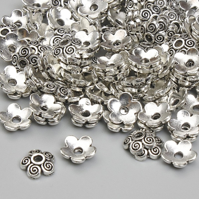 Kapturek do koralika, srebrny kolor metalu, średnica 6,5 mm ±, otwór 1,6 mm ±, opakowanie 20 g ± (~123 szt.)