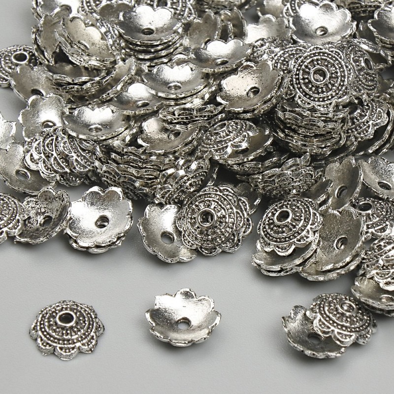 Kapturek do koralików, średnica 7 mm ±, otwór 1,4 mm ±, srebrny kolor metalu, opakowanie 20 g ± (~145 szt.)
