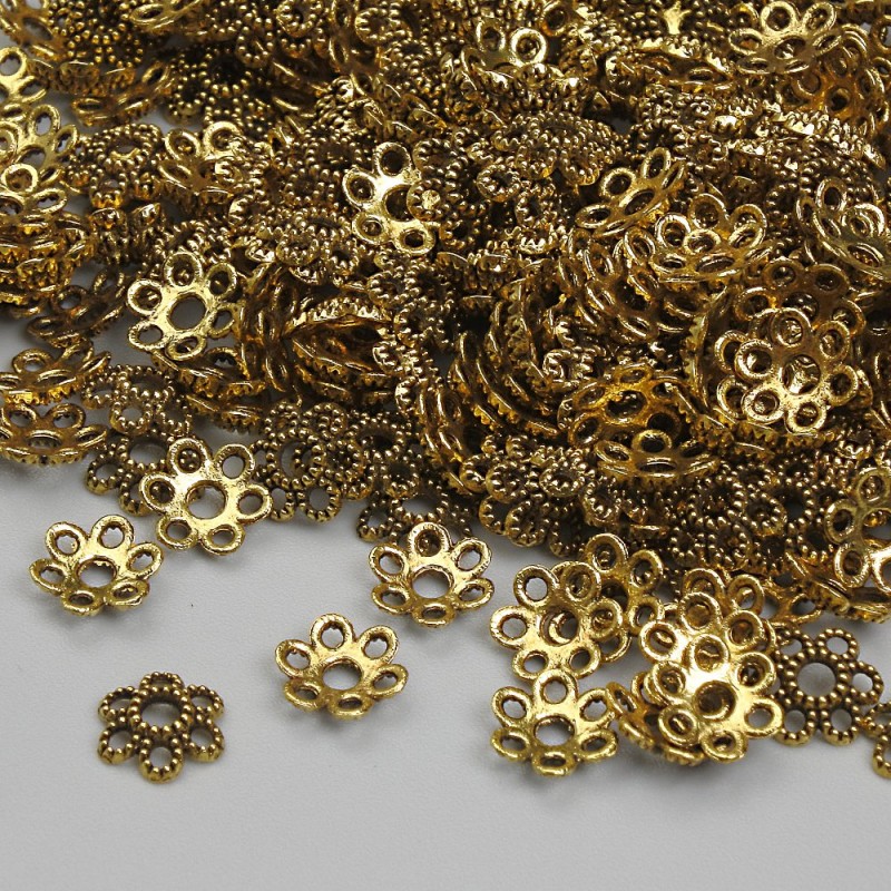 Kapturek do koralików w kolorze złotym, średnica 6 mm, otwór 1,9 mm, opakowanie 20 g (~355 szt.)