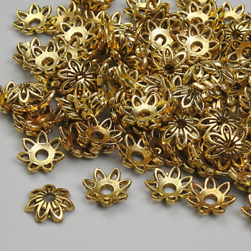 Kapturki do koralików w kolorze złotego metalu, średnica około 8 mm, otwór około 1,9 mm, opakowanie 20 g (~110 szt.)