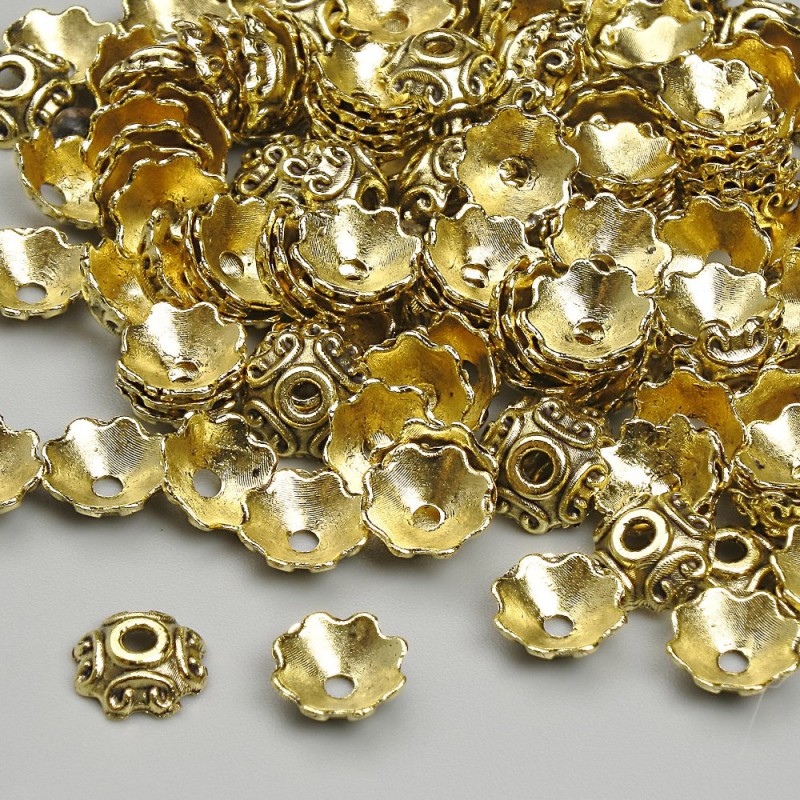 Czapeczki do koralików, kolor metalu złoto, średnica około 6,5 mm, otwór około 1,7 mm, opakowanie 20 g (~140 szt.)