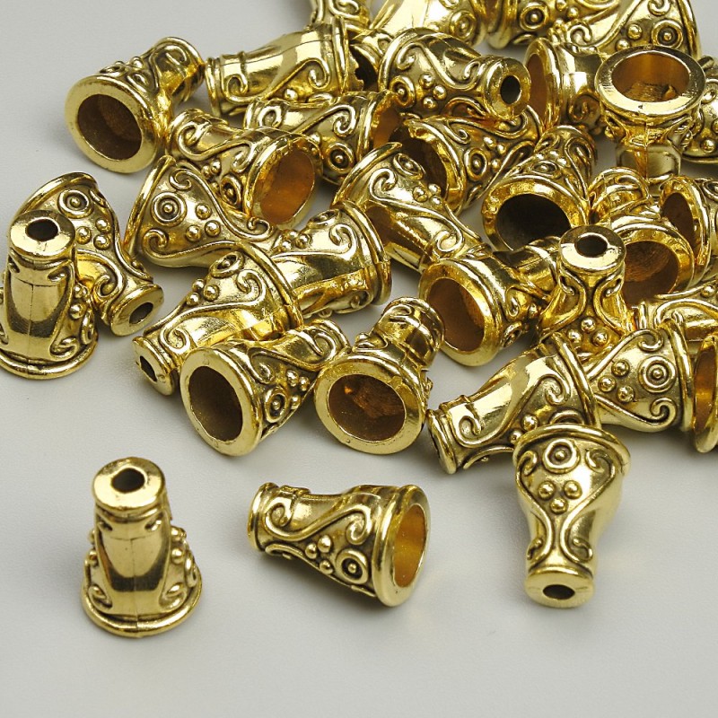 Końcówka jubilerska, średnica 10×7 mm, otwór ok. 2,1 mm, złoty kolor metalu, opakowanie 20 g (~35 szt.)