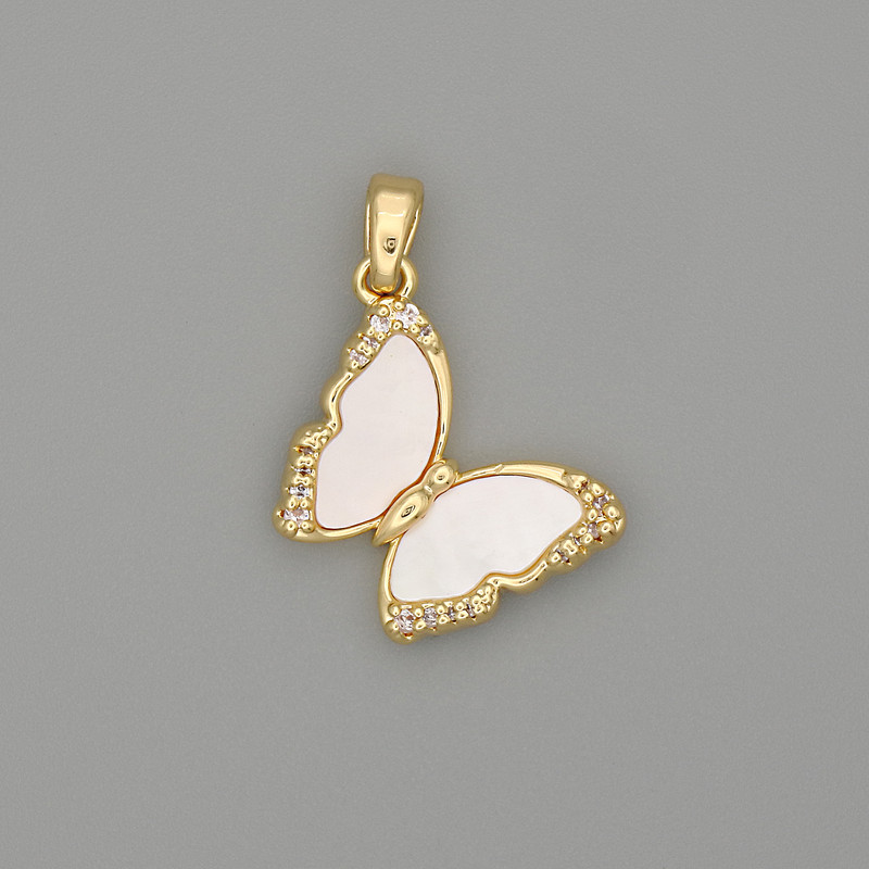 Wisiorek motyl perłowy, metal złocisty, z cyrkoniami, średnica 23×17 mm