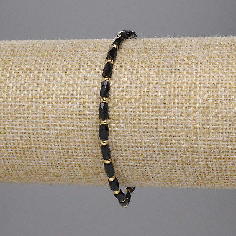 Bransoletka z czeskiego czarnego kryształu, szlifowane cylindry 5×3 mm, kuleczki 2 mm, długość 18 cm, elastyczna