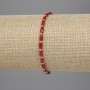 Bransoletka z czerwonego czeskiego kryształu, fasetowane cylindry 5×3 mm, kuleczka 2 mm, elastyczna, długość 18 cm