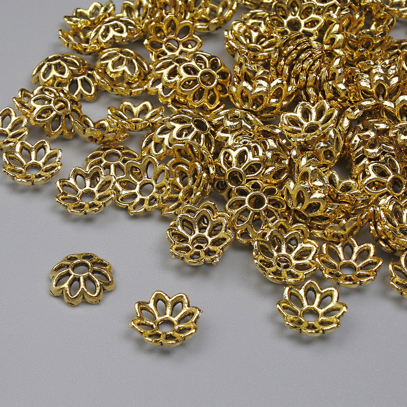 Kapeluszki do koralików, kolor metalu: złoto, średnica 7×1 mm ± otwór, średnica 1,5 mm ± opakowanie 20 g (~143 szt.)
