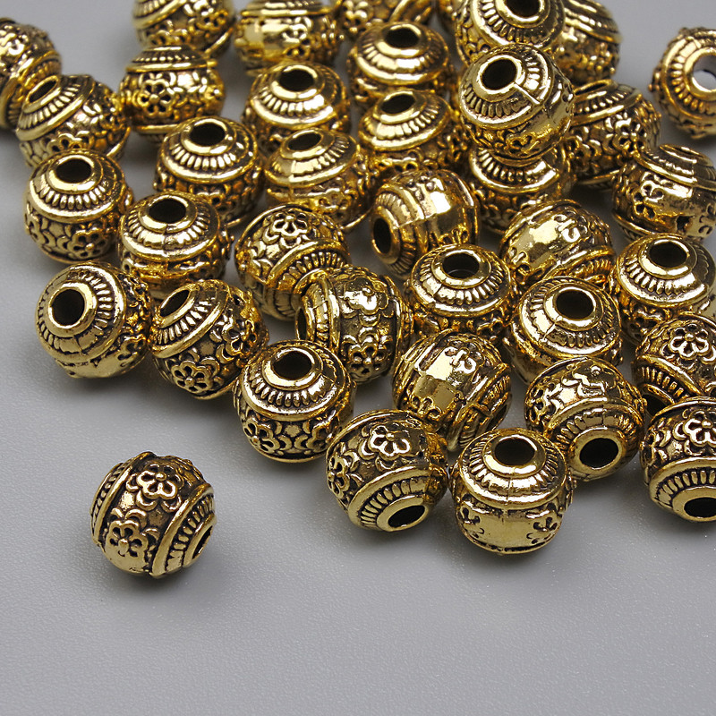 Złociste wkładki koralikowe, kolor metalu złocisty, średnica 5 mm ±, średnica otworu 1,5 mm ±, opakowanie 20 g ~38 szt. +
