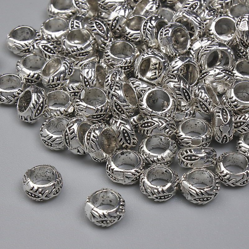 Koralik-wstawka, kolor metaliczny srebrny, średnica 5×3 mm ± otwór, średnica 3,5 mm ± opakowanie 20 g ~104 szt.