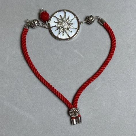 Bransoletka tekstylna, średnica 5,5 mm ±, regulowana poprzez przeciąganie, z metalową wkładką, średnica 24 mm ±, metal w kolorze srebra