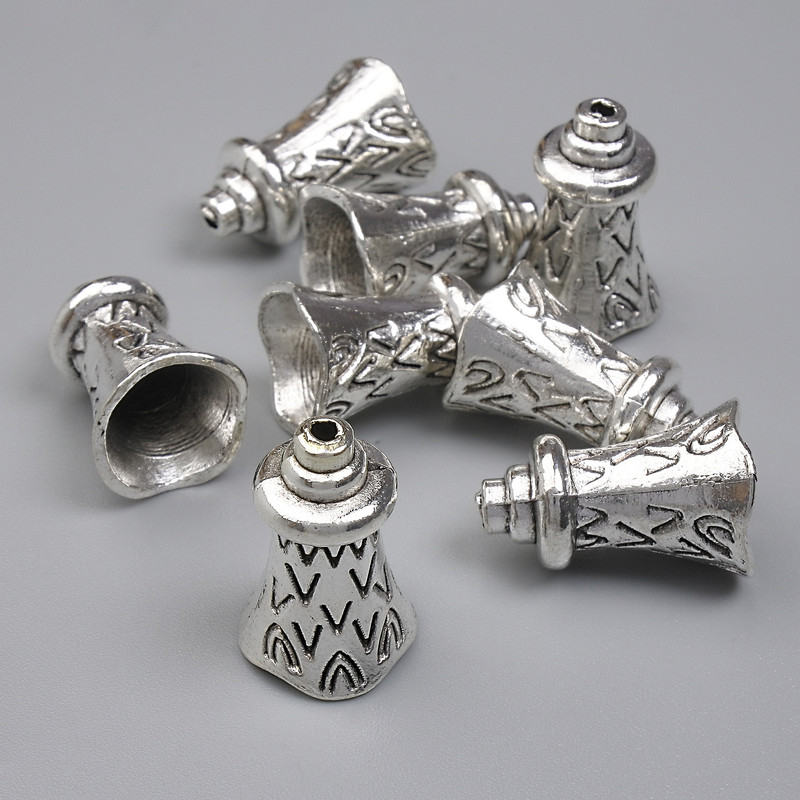 Końcówka jubilerska do koralików, kolor metalu srebrny, średnica 17×11 mm, otwór około 1 mm, opakowanie 20 g (~8 szt.)