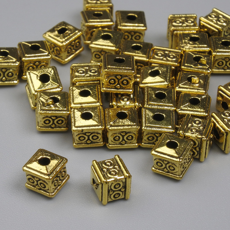 Złota koralik-wkładka w kolorze złotego metalu, średnica 5×5 mm, otwór Ø około 1,5 mm, opakowanie 20 g (~36 szt.)