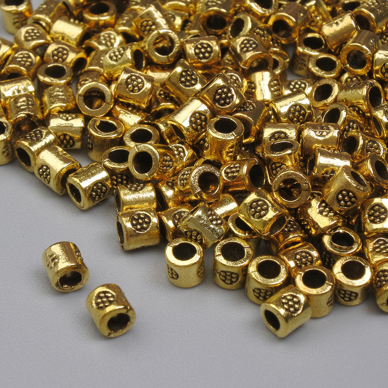 Koraliki-wstawki, kolor metalu złoty, średnica 3,5×3 mm ± otwór 1,4 mm ± opakowanie 20 g (~195 szt.)