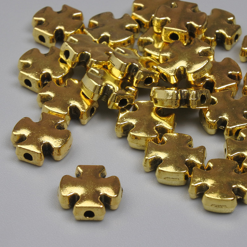 Koralik-wstawka w kształcie krzyża, kolor złoty, średnica 9×9 mm ± otwór ok. 1,3 mm ± opakowanie 20 g (~24 szt.)