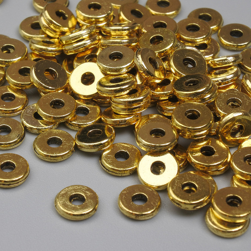 Okucia jubilerskie – koralik-wkładka, kolor metalu: złoty, średnica 6×1,5 mm, otwór 1,7 mm, opakowanie 20 g (~99 szt.)