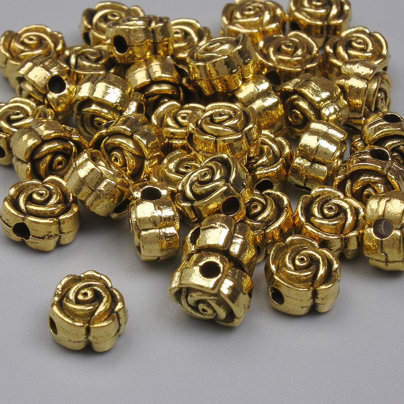 Koralik-wstawka w kolorze złota, średnica 6×4 mm, otwór 1,5 mm, opakowanie 20 g (~37 szt.)