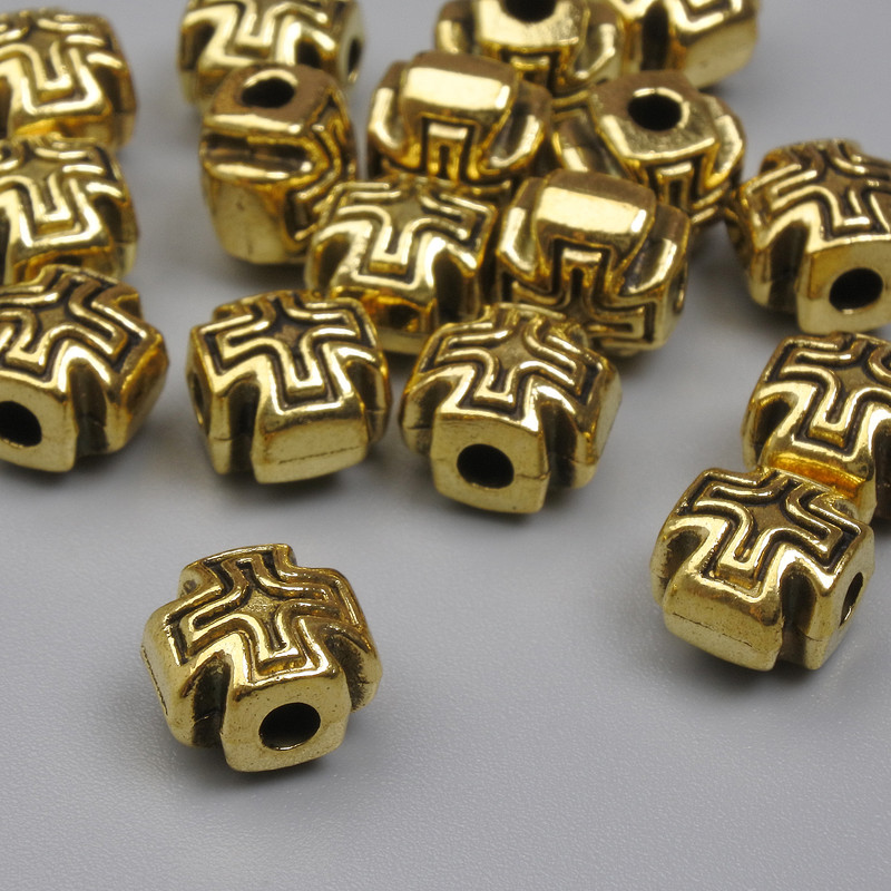 Wstawka-koralik w formie krzyża, kolor złoty (metal), średnica 8×8 mm, otwór 2 mm, opakowanie 20 g (~15 szt.)