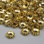 Koralik-wstawka w kolorze złotego metalu, średnica 6×2,5 mm, otwór 2,2 mm, opakowanie 20 g (~74 szt.)