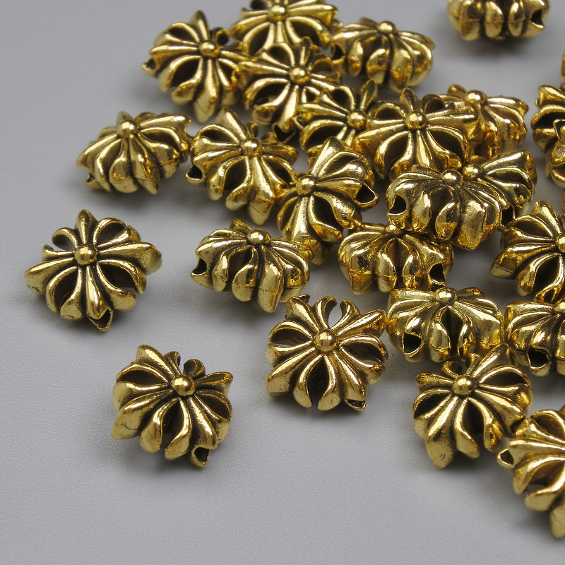 Koralik-wstawka w kolorze złotym, średnica 9 mm, otwór 1 mm, opakowanie 20 g (~29 szt.)