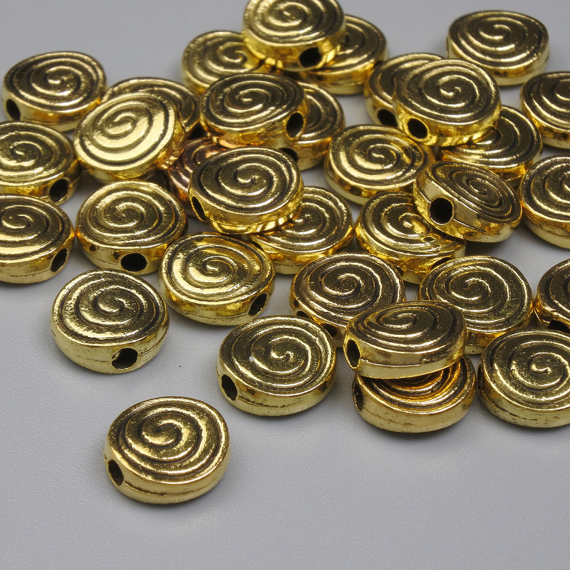 Koralik-wkładka w kolorze złota, średnica 8 mm, otwór ok. 1,6 mm, opakowanie 20 g (~33 szt.)