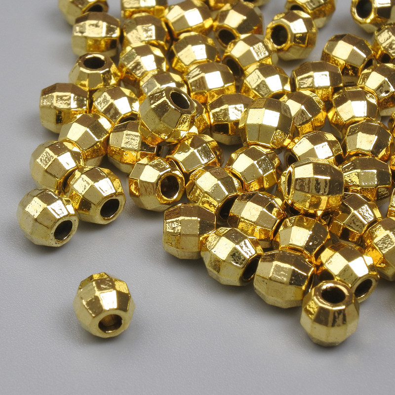 Wkładka koralikowa w kolorze złotym, średnica 4,5 mm, otwór średnicy około 1,7 mm, opakowanie 20 g (~61 szt.)