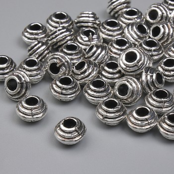 Akcesoria jubilerskie – koralik-wstawka w kolorze metalu: srebro, średnica 6×4,5 mm +/- otwór 2,5 mm +/- opakowanie 20 g (~42 szt.)