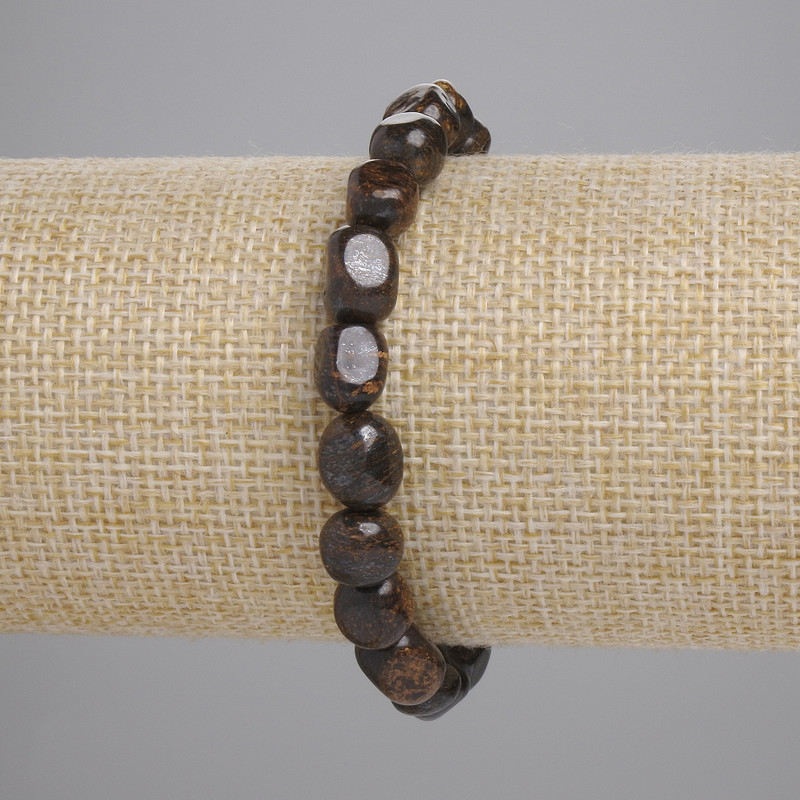 Bransoleta z bronzytu, kulki fasetowane, średnica 7–12×7–8 mm, długość około 18 cm, na elastycznej bazie