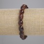 Bransoletka z granatu hessonitu fasetowana, średnica 9–13×8–10 mm, długość 18 cm, elastyczna