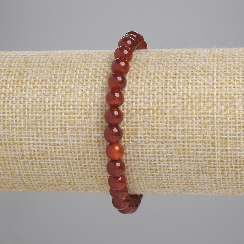Bransoletka z karneolu, gładkie kuleczki, średnica 6 mm, długość 18 cm, na elastycznej gumce