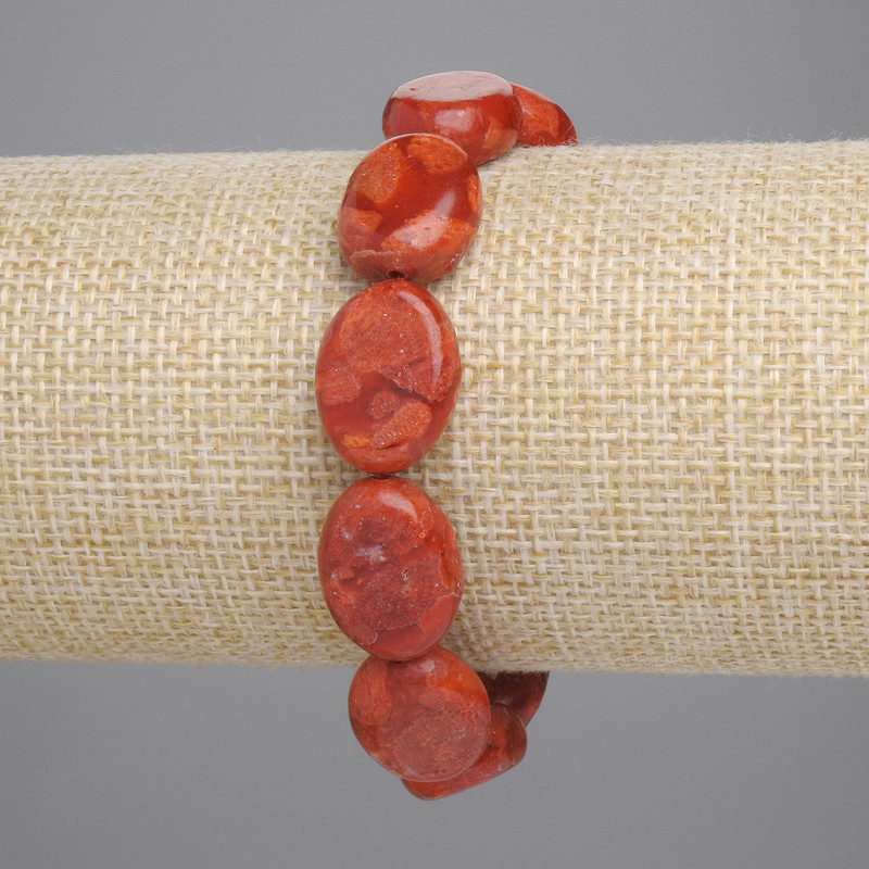 Bransoletka z porowatego koralu owalna, średnica około 16×12 mm, elastyczna, długość 18 cm