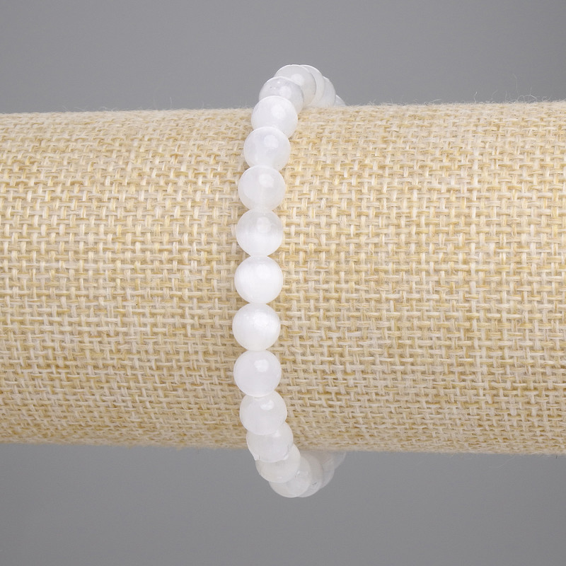 Bransoletka z selenitu, gładkie kulki, średnica 6,5 mm, długość 18 cm, elastyczna