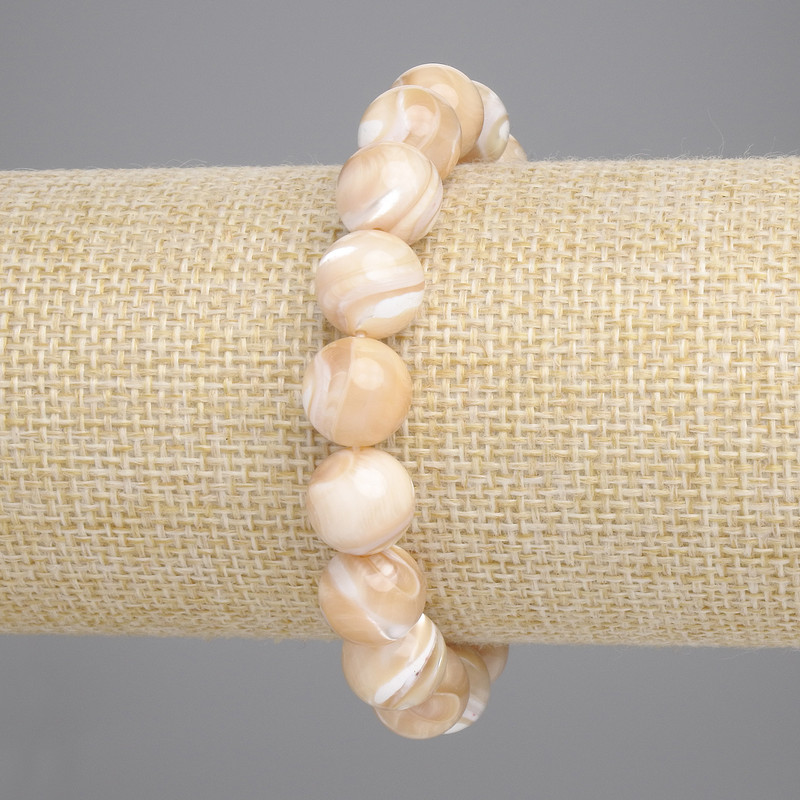 Bransoletka beżowa z masą perłową, gładkie kuleczki, średnica 10,5 mm, długość 18 cm, elastyczna