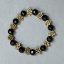 Bransoletka agatowa (sztuczna) z czeskiego szkła – fasetowana kula, średnica ok. 9,5 mm, z metalowymi wstawkami, długość 18 cm, elastyczna
