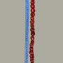 Koraliki z naturalnego koralu, fasetowane, w asortymencie rozmiarów, średnica od 12–20 × 18–24 mm, masa ok. 258 g, długość 42 cm ± na żyłce