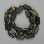 Koraliki z zielonego turmalinu (epidot), fasetowane, średnica 18–25×10–14 mm, kuleczka agatowa 4 mm, długość 40 cm, na nici