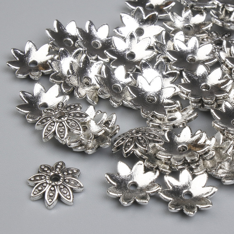 Kapturek do koralików, kolor metalu: srebro, średnica kapturka 9,5×1 mm ±, otwór 1,7 mm ±, opakowanie 40 szt. +