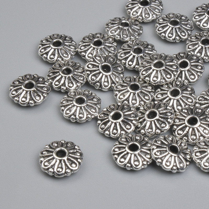 Koralik-wstawka, kolor metalu srebrny, średnica 8 mm, otwór 1,6 mm, opakowanie ~25 szt.