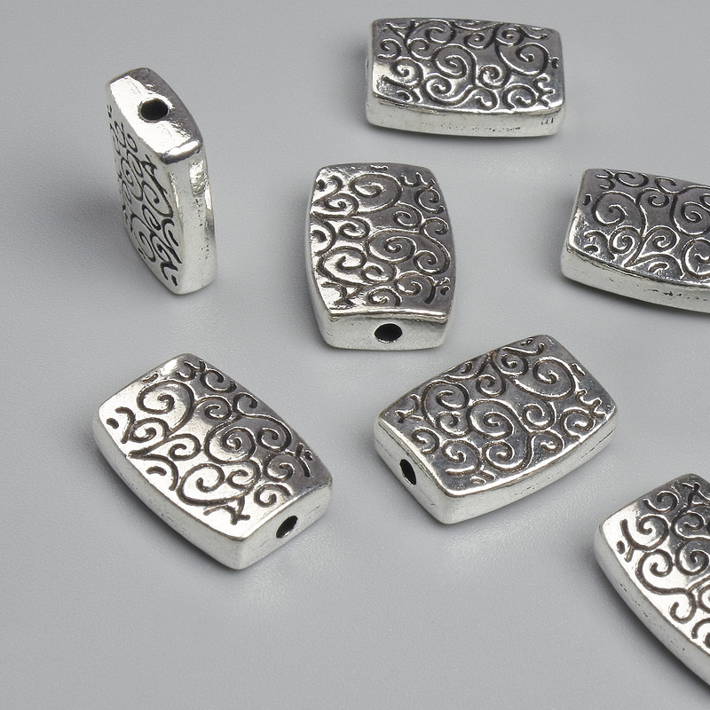 Koralik-wstawka o kolorze metalu srebro, średnica 14×10 mm ± otwór 2 mm ± opakowanie ~8 szt.