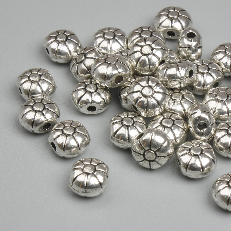 Koralik-wstawka o kolorze metalu srebrnym, średnica 5,5 mm ± otwór 1,3 mm ± opakowanie 20 g ~32 szt.