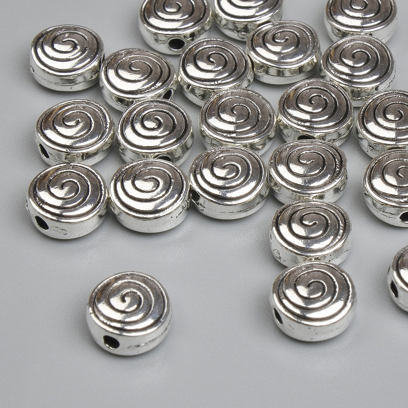 Koralik-wstawka o kolorze srebrnym, średnica 7,5 mm ± otwór 1,5 mm ± opakowanie 20 g ~22 szt.
