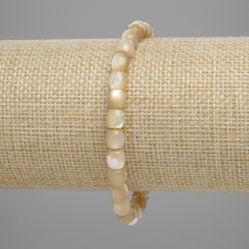 Bransoletka z beżowej masy perłowej w kształcie beczki, średnica 6×6 mm, długość 18 cm, elastyczna