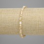 Bransoletka z beżowej masy perłowej, fasetowane kostki 3x3 mm, długość 18 cm, na gumce