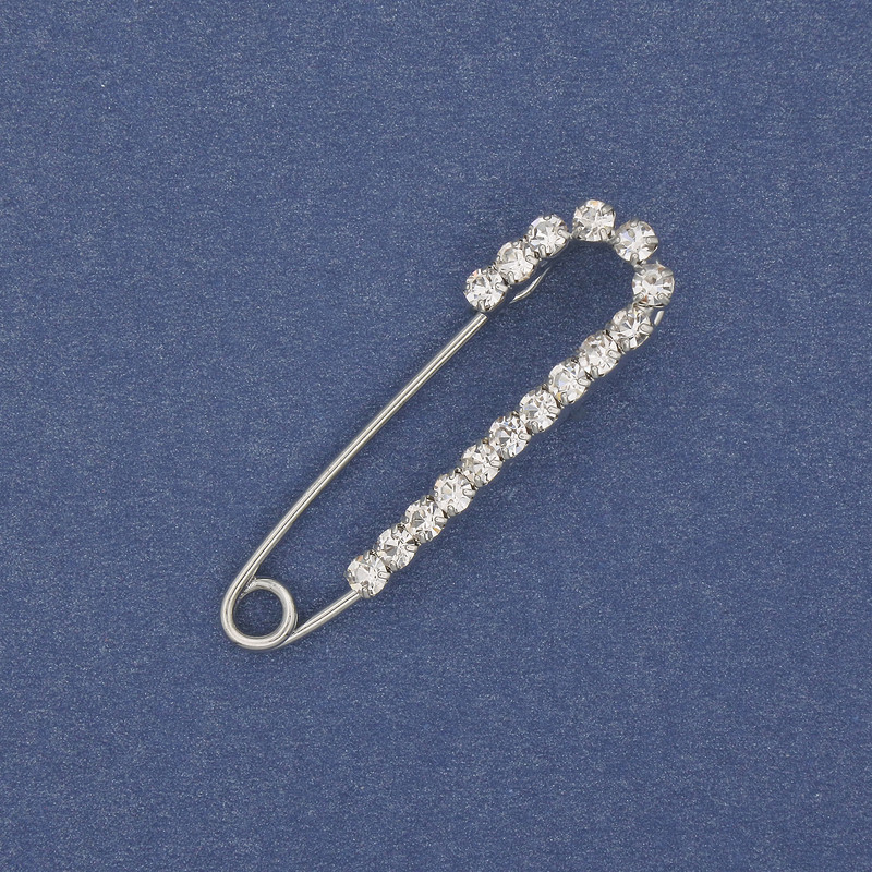 Broszka‑szpilka z białymi cyrkoniami 36×10 mm ± metal srebrzysty